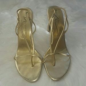 Gold heels size 7.5 + jewelry